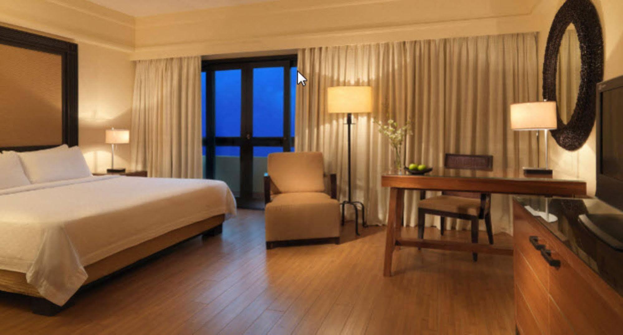 ไฮแอท รีเจนซี กวนตัน รีสอร์ต Hotel ภายนอก รูปภาพ A room at the hotel